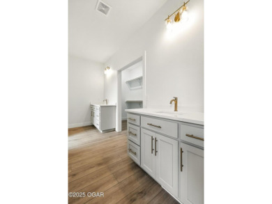 Welcome to 4402 Par Ln, a beautifully designed new construction on Twin Hills Golf and Country Club in Missouri - for sale on GolfHomes.com, golf home, golf lot