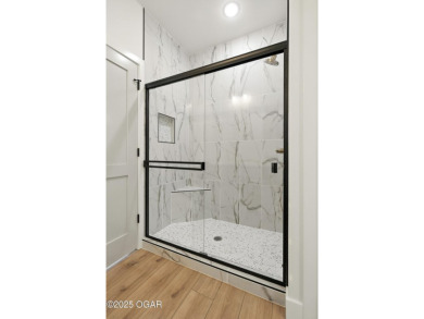 Welcome to 4402 Par Ln, a beautifully designed new construction on Twin Hills Golf and Country Club in Missouri - for sale on GolfHomes.com, golf home, golf lot