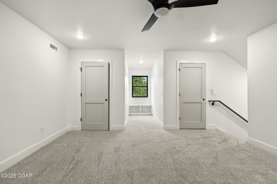 Welcome to 4402 Par Ln, a beautifully designed new construction on Twin Hills Golf and Country Club in Missouri - for sale on GolfHomes.com, golf home, golf lot