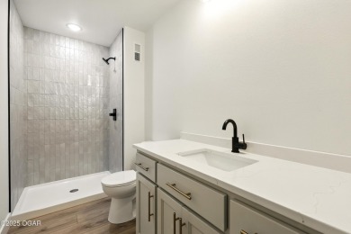 Welcome to 4402 Par Ln, a beautifully designed new construction on Twin Hills Golf and Country Club in Missouri - for sale on GolfHomes.com, golf home, golf lot