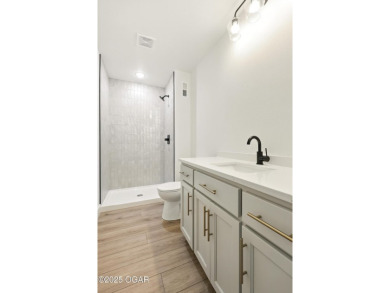 Welcome to 4402 Par Ln, a beautifully designed new construction on Twin Hills Golf and Country Club in Missouri - for sale on GolfHomes.com, golf home, golf lot