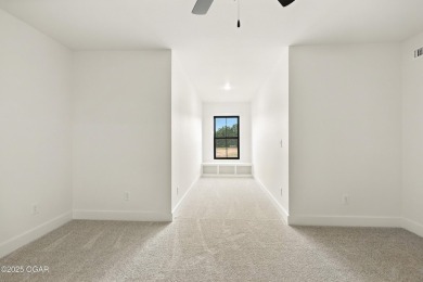 Welcome to 4402 Par Ln, a beautifully designed new construction on Twin Hills Golf and Country Club in Missouri - for sale on GolfHomes.com, golf home, golf lot