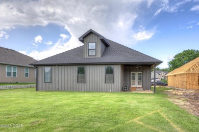 Welcome to 4402 Par Ln, a beautifully designed new construction on Twin Hills Golf and Country Club in Missouri - for sale on GolfHomes.com, golf home, golf lot