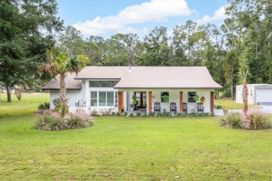 A Must-See Gem on the 11th Hole!  Step into refined living with on Country Club At Lake City in Florida - for sale on GolfHomes.com, golf home, golf lot