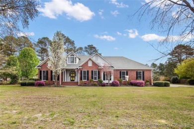 This charming brick home is nestled on the 17th fairway of on Cypress Lakes Golf Course in North Carolina - for sale on GolfHomes.com, golf home, golf lot