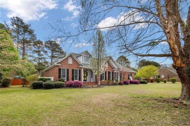 This charming brick home is nestled on the 17th fairway of on Cypress Lakes Golf Course in North Carolina - for sale on GolfHomes.com, golf home, golf lot