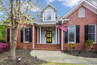 This charming brick home is nestled on the 17th fairway of on Cypress Lakes Golf Course in North Carolina - for sale on GolfHomes.com, golf home, golf lot