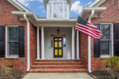 This charming brick home is nestled on the 17th fairway of on Cypress Lakes Golf Course in North Carolina - for sale on GolfHomes.com, golf home, golf lot