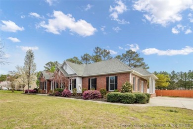 This charming brick home is nestled on the 17th fairway of on Cypress Lakes Golf Course in North Carolina - for sale on GolfHomes.com, golf home, golf lot