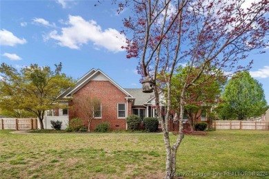 This charming brick home is nestled on the 17th fairway of on Cypress Lakes Golf Course in North Carolina - for sale on GolfHomes.com, golf home, golf lot