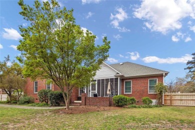 This charming brick home is nestled on the 17th fairway of on Cypress Lakes Golf Course in North Carolina - for sale on GolfHomes.com, golf home, golf lot