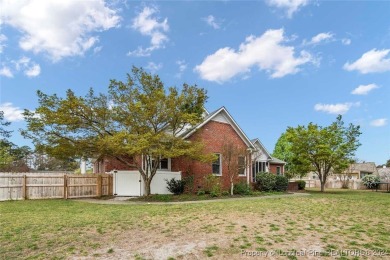 This charming brick home is nestled on the 17th fairway of on Cypress Lakes Golf Course in North Carolina - for sale on GolfHomes.com, golf home, golf lot