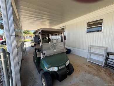 Golf cart home!!!! Located in a 55 plus community where you own on High Point Golf Club, Inc. in Florida - for sale on GolfHomes.com, golf home, golf lot
