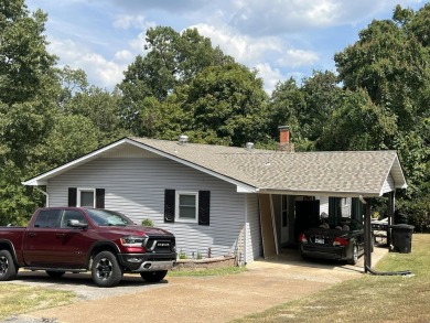 This is a totally remodeled, upgraded and updated 3 bedroom 2 on The Course At Turkey Mountain in Arkansas - for sale on GolfHomes.com, golf home, golf lot