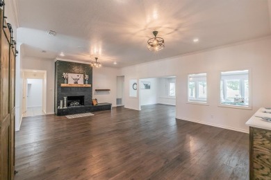 Welcome to this beautifully updated home located in the on De Cordova Bend Country Club in Texas - for sale on GolfHomes.com, golf home, golf lot