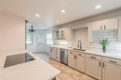 Welcome to this beautifully updated home located in the on De Cordova Bend Country Club in Texas - for sale on GolfHomes.com, golf home, golf lot