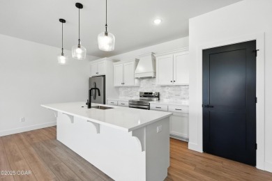 Welcome to 4308 Par Ln, a beautifully designed new construction on Twin Hills Golf and Country Club in Missouri - for sale on GolfHomes.com, golf home, golf lot
