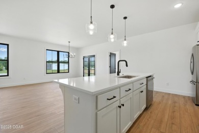 Welcome to 4308 Par Ln, a beautifully designed new construction on Twin Hills Golf and Country Club in Missouri - for sale on GolfHomes.com, golf home, golf lot