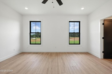 Welcome to 4308 Par Ln, a beautifully designed new construction on Twin Hills Golf and Country Club in Missouri - for sale on GolfHomes.com, golf home, golf lot