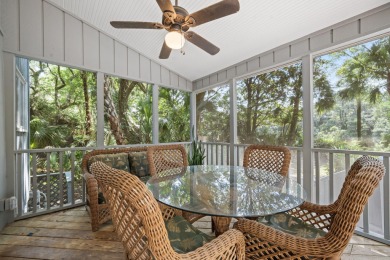 With sweeping views across Cougar Point Golf Course and a serene on Kiawah Island Resort - Cougar Point in South Carolina - for sale on GolfHomes.com, golf home, golf lot