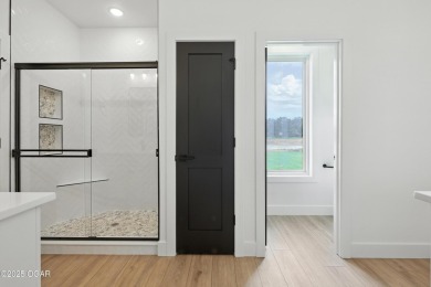Welcome to 4308 Par Ln, a beautifully designed new construction on Twin Hills Golf and Country Club in Missouri - for sale on GolfHomes.com, golf home, golf lot