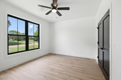 Welcome to 4308 Par Ln, a beautifully designed new construction on Twin Hills Golf and Country Club in Missouri - for sale on GolfHomes.com, golf home, golf lot