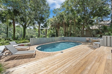 With sweeping views across Cougar Point Golf Course and a serene on Kiawah Island Resort - Cougar Point in South Carolina - for sale on GolfHomes.com, golf home, golf lot