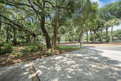 With sweeping views across Cougar Point Golf Course and a serene on Kiawah Island Resort - Cougar Point in South Carolina - for sale on GolfHomes.com, golf home, golf lot