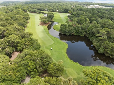 With sweeping views across Cougar Point Golf Course and a serene on Kiawah Island Resort - Cougar Point in South Carolina - for sale on GolfHomes.com, golf home, golf lot