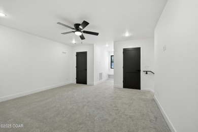 Welcome to 4308 Par Ln, a beautifully designed new construction on Twin Hills Golf and Country Club in Missouri - for sale on GolfHomes.com, golf home, golf lot
