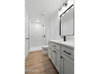 Welcome to 4308 Par Ln, a beautifully designed new construction on Twin Hills Golf and Country Club in Missouri - for sale on GolfHomes.com, golf home, golf lot