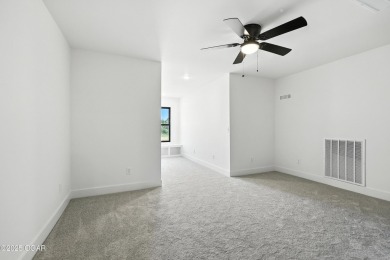 Welcome to 4308 Par Ln, a beautifully designed new construction on Twin Hills Golf and Country Club in Missouri - for sale on GolfHomes.com, golf home, golf lot
