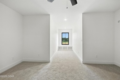 Welcome to 4308 Par Ln, a beautifully designed new construction on Twin Hills Golf and Country Club in Missouri - for sale on GolfHomes.com, golf home, golf lot