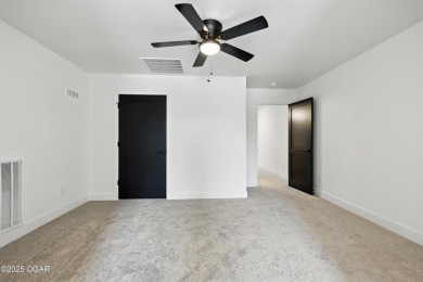 Welcome to 4308 Par Ln, a beautifully designed new construction on Twin Hills Golf and Country Club in Missouri - for sale on GolfHomes.com, golf home, golf lot