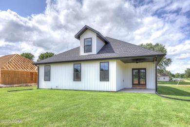 Welcome to 4308 Par Ln, a beautifully designed new construction on Twin Hills Golf and Country Club in Missouri - for sale on GolfHomes.com, golf home, golf lot
