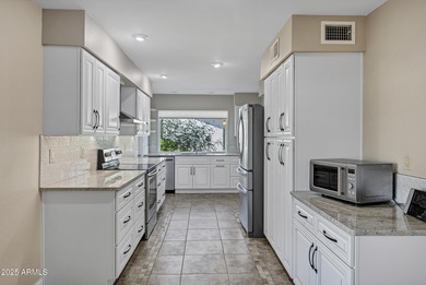 Perfectly positioned on the 12th hole of Ahwatukee Golf Club on Ahwatukee Country Club in Arizona - for sale on GolfHomes.com, golf home, golf lot