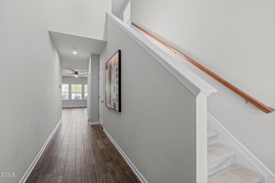 Greeted by a stacked-stone, covered front porch and classic on The Club At Twelve Oaks in North Carolina - for sale on GolfHomes.com, golf home, golf lot