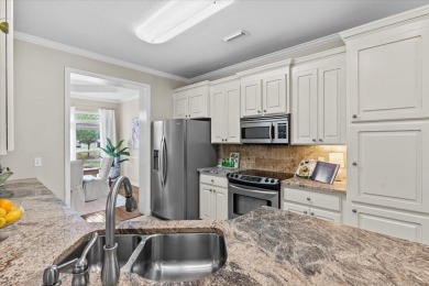 Welcome to 103 Gladstone, a charming home located in the highly on Highland Oaks Golf Course in Alabama - for sale on GolfHomes.com, golf home, golf lot