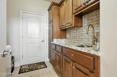 Don't miss your chance to own this stunning 5,600 sq ft estate on Carthage Municipal Golf Course in Missouri - for sale on GolfHomes.com, golf home, golf lot