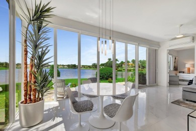 Spectacular contemporary condo features cinematic water views on Broken Sound Golf and Club  in Florida - for sale on GolfHomes.com, golf home, golf lot