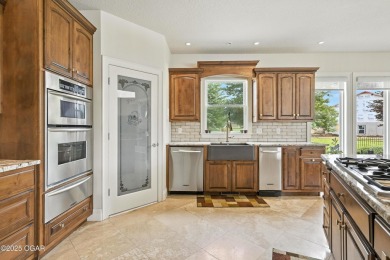 Don't miss your chance to own this stunning 5,600 sq ft estate on Carthage Municipal Golf Course in Missouri - for sale on GolfHomes.com, golf home, golf lot