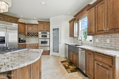 Don't miss your chance to own this stunning 5,600 sq ft estate on Carthage Municipal Golf Course in Missouri - for sale on GolfHomes.com, golf home, golf lot