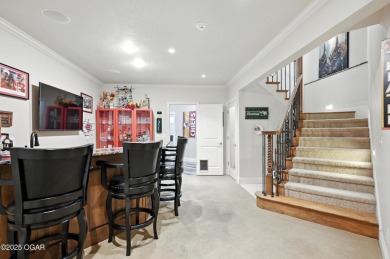 Don't miss your chance to own this stunning 5,600 sq ft estate on Carthage Municipal Golf Course in Missouri - for sale on GolfHomes.com, golf home, golf lot
