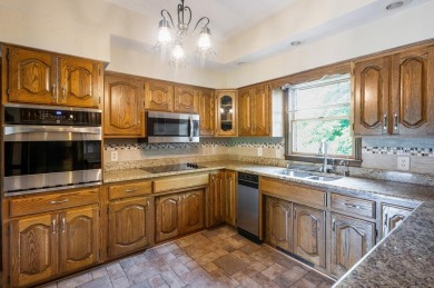 Tucked along the scenic fairways of one of Elizabethtown's on Elizabethtown Country Club in Kentucky - for sale on GolfHomes.com, golf home, golf lot