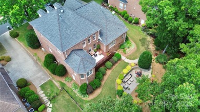Discover refined living in this elegant full brick home on 3rd on The Palisades Country Club in North Carolina - for sale on GolfHomes.com, golf home, golf lot