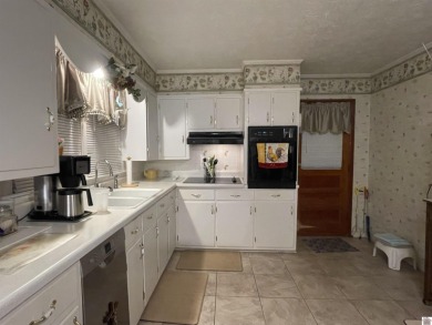 Looking for a home with a level yard and fenced for your pets? on  in Kentucky - for sale on GolfHomes.com, golf home, golf lot