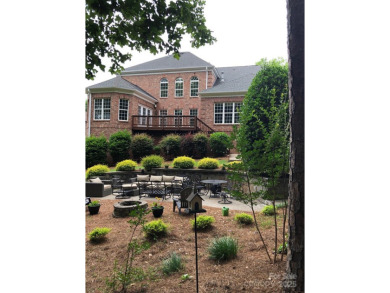 Discover refined living in this elegant full brick home on 3rd on The Palisades Country Club in North Carolina - for sale on GolfHomes.com, golf home, golf lot