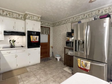 Looking for a home with a level yard and fenced for your pets? on  in Kentucky - for sale on GolfHomes.com, golf home, golf lot