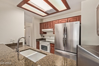 Enjoy the view on your extended patio over-looking the golf on Fountain of the Sun Country Club in Arizona - for sale on GolfHomes.com, golf home, golf lot