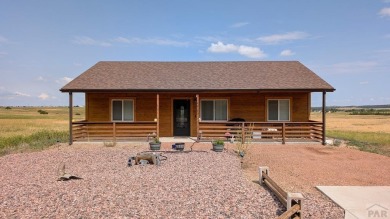 This charming 3-bed, 2-bath ranch offers modern finishes, a on Hollydot Golf Course in Colorado - for sale on GolfHomes.com, golf home, golf lot